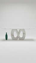 Sculptural marble dining table with bold veining